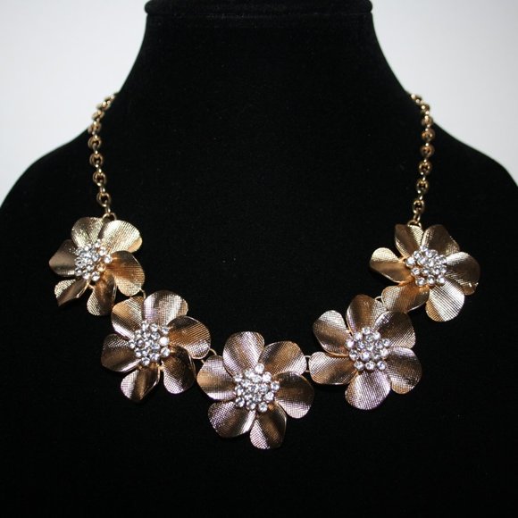 Stunning gold and cz flower bib necklace 18"